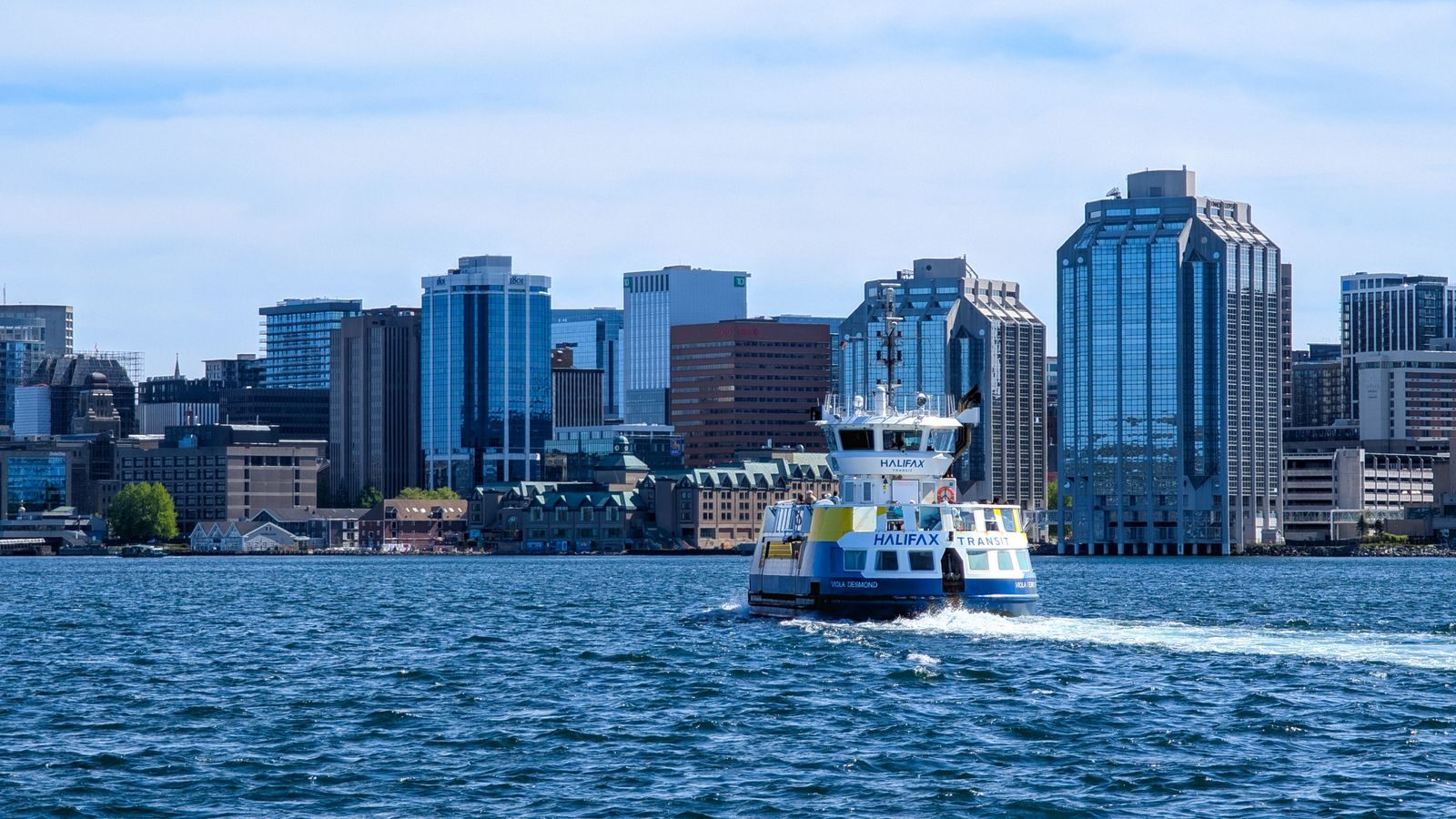 Ferry crossing the harbour toward the Halifax skyline