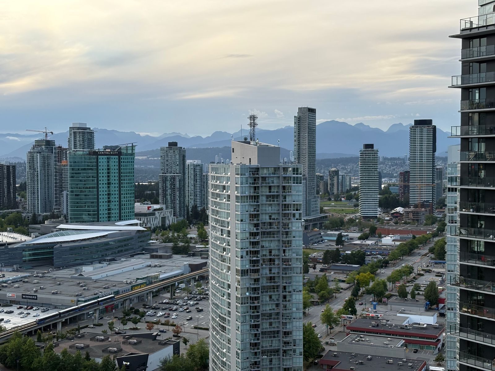 Surrey, British Columbia skyline with mountains at dusk